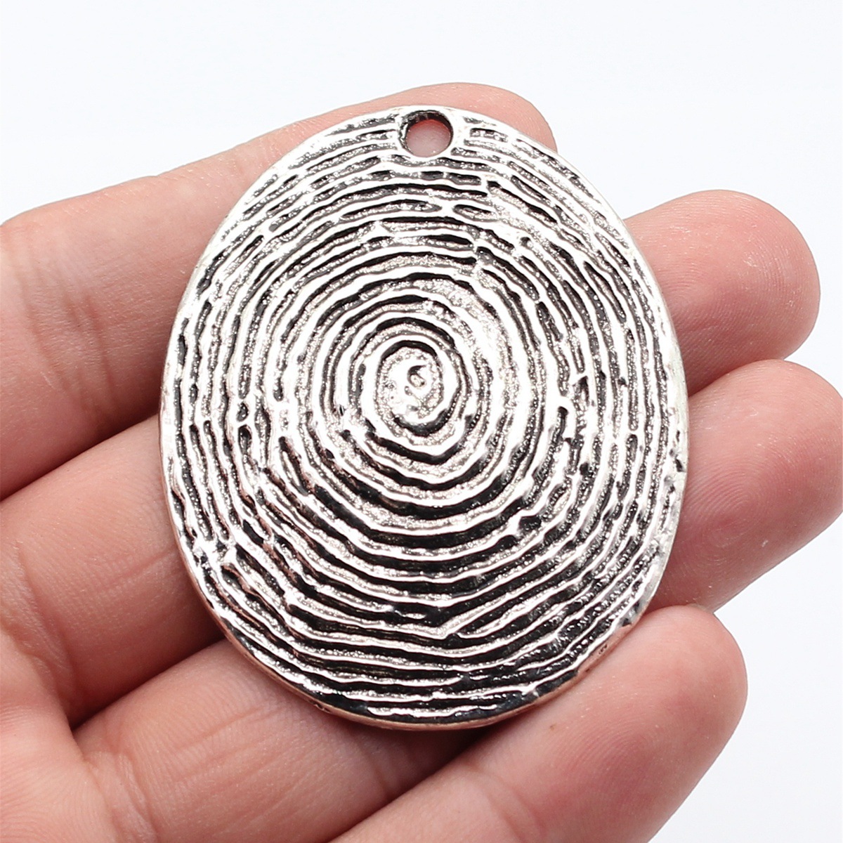 Pendentif tourbillon empreinte - Vintage Collectibles For Sale avis et prix